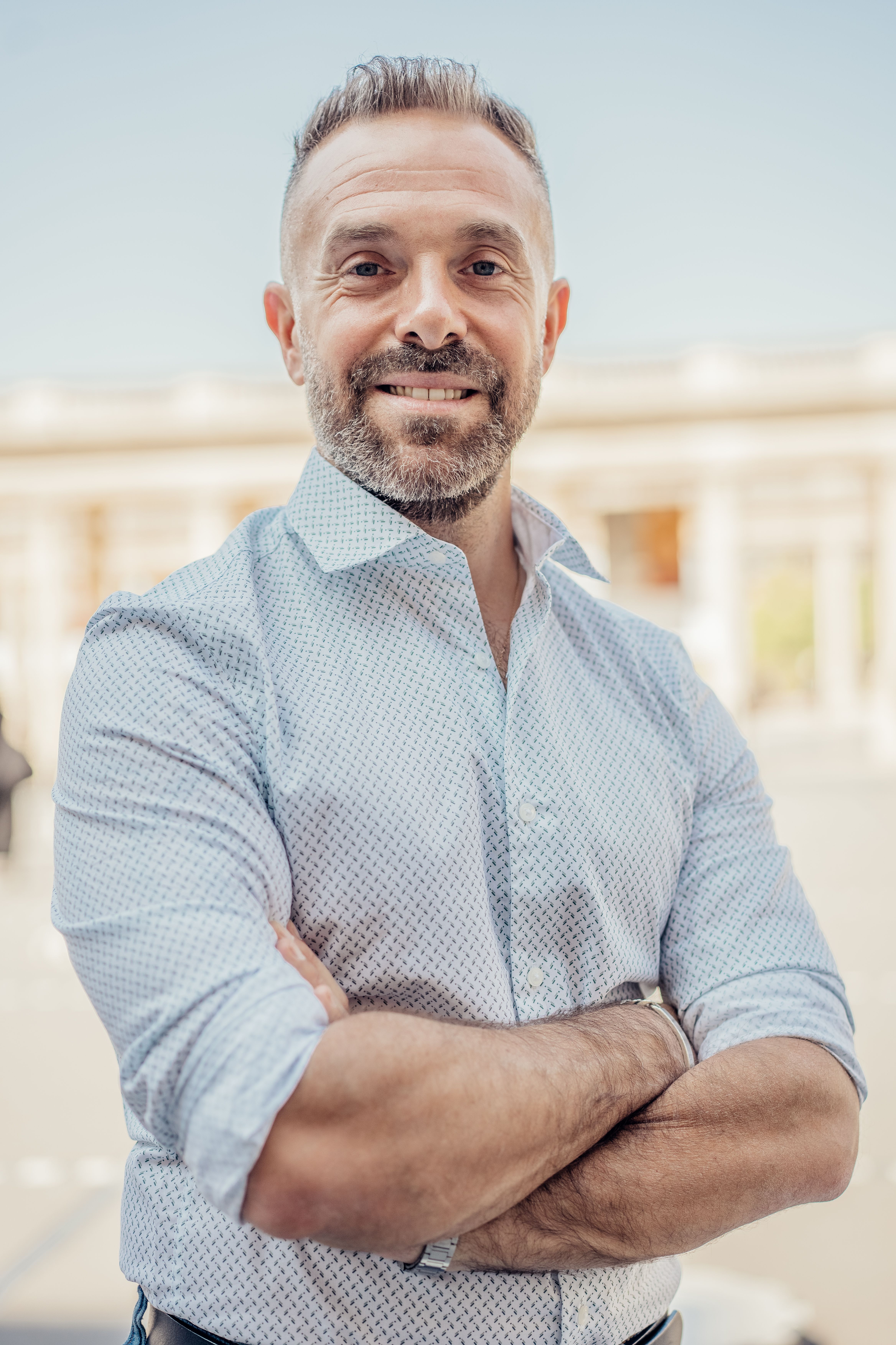 Man in his fifties standing outdoors